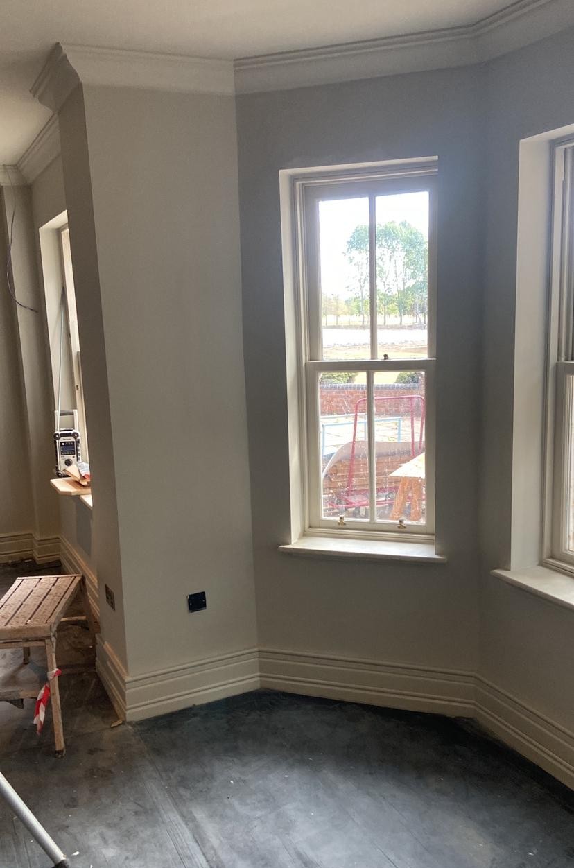 Hotel bay window corner with fresh paintwork